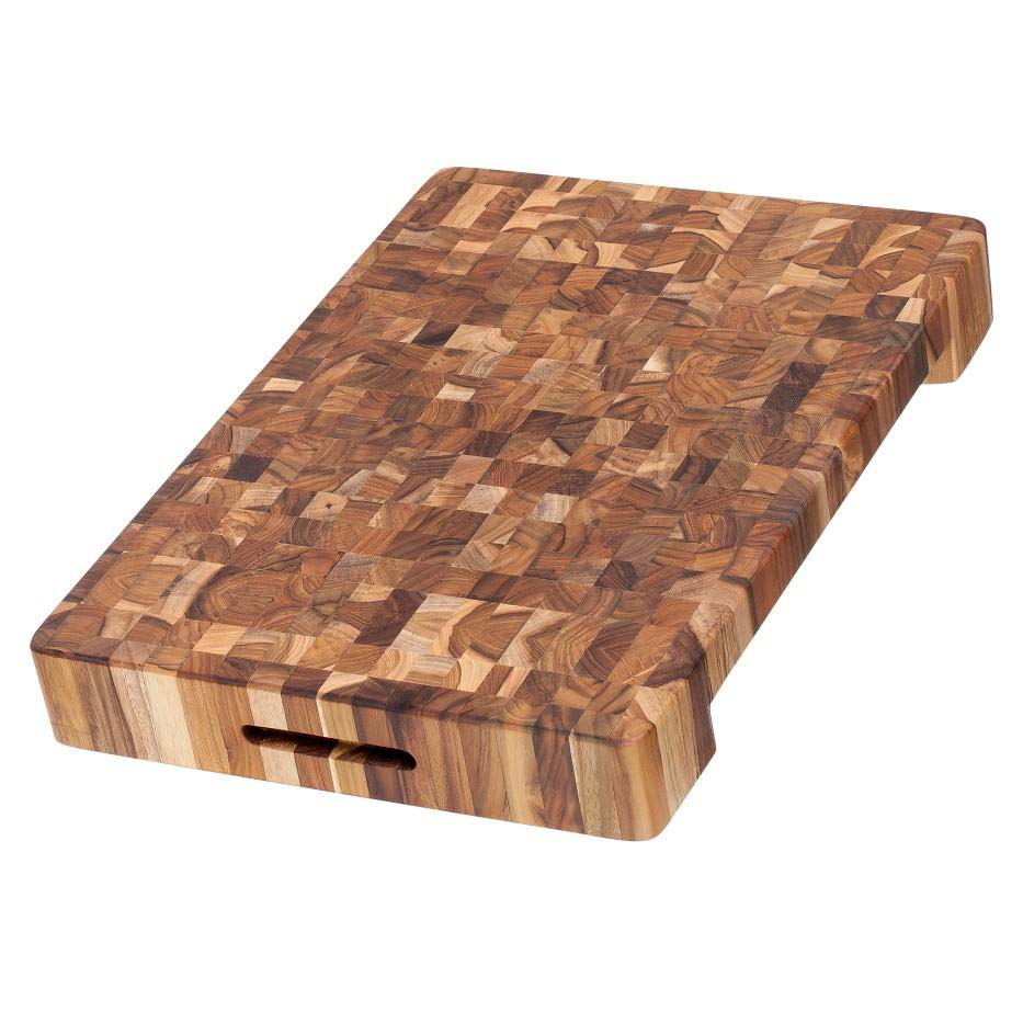 Extra thick teak wood butcher block with end grain pattern, side hand grips, and a built-in plate cutout.